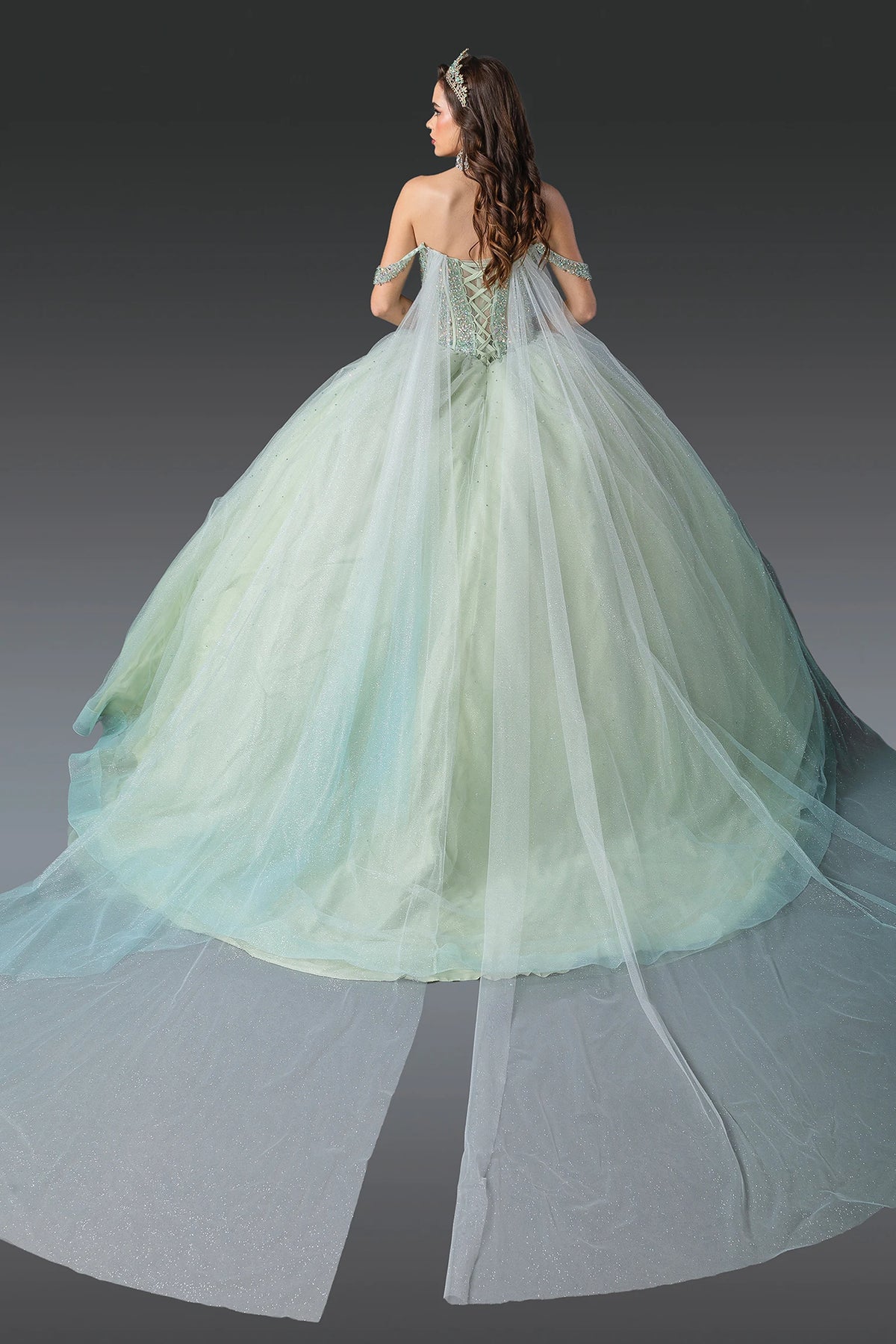 Back view of a Mint quinceañera gown showing lace-up back