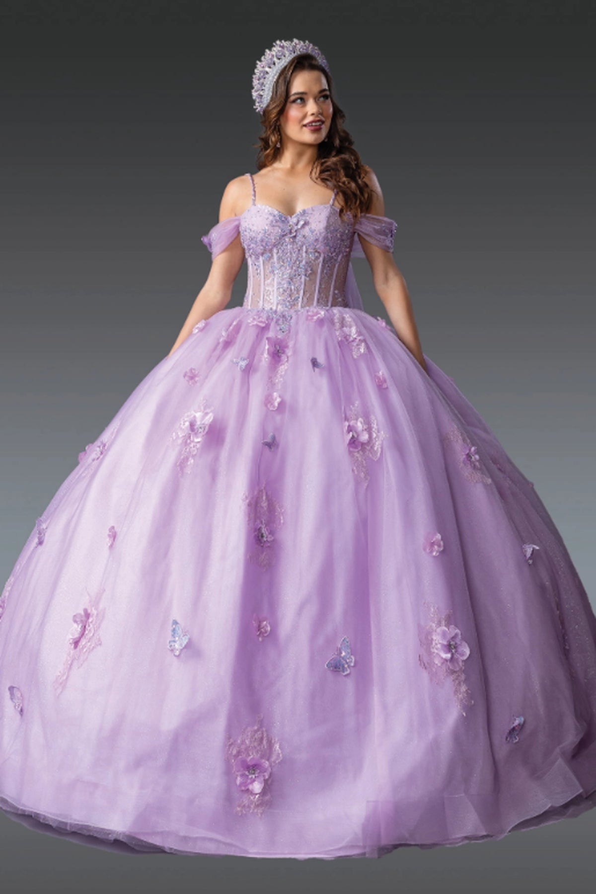 Front view of a Lilac quinceañera gown with strapless neckline, beaded bodice, and floral appliqués