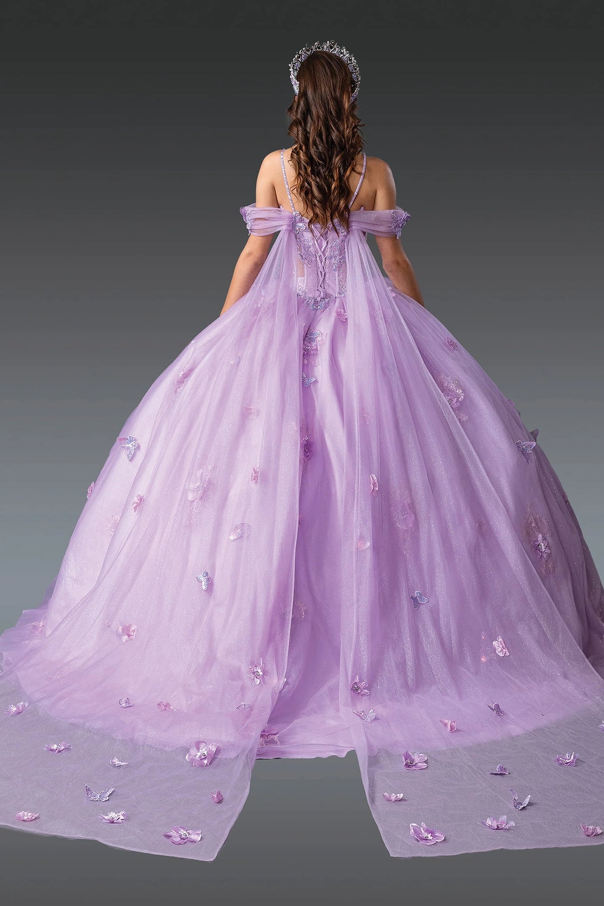 Rear view of a Lilac quinceañera gown showing lace-up back and floral appliqués
