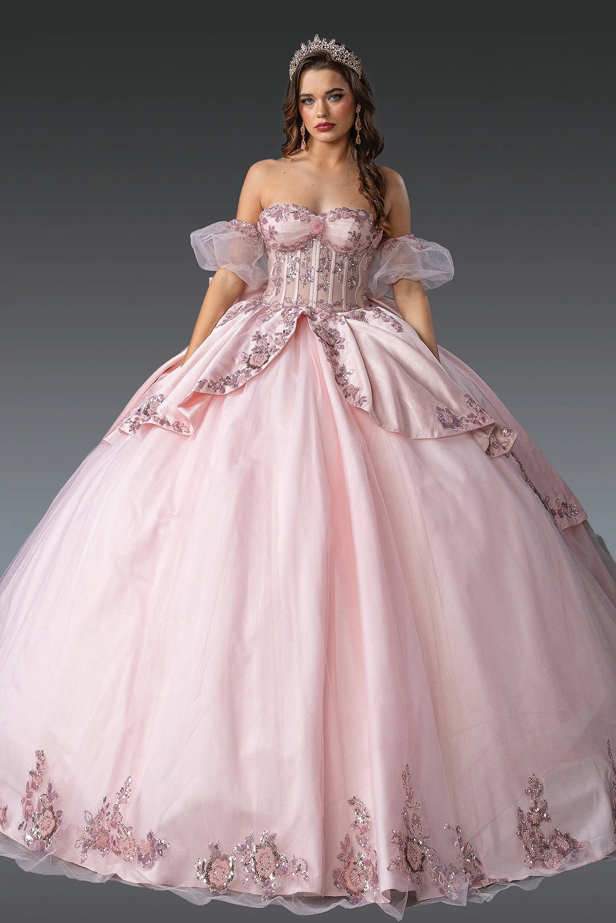 Front view of a Blush quinceañera gown with strapless neckline and beaded bodice