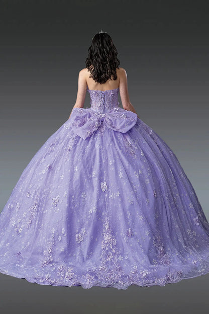 lilac ball gown with a large bow and 3d floral appliques on a plain background