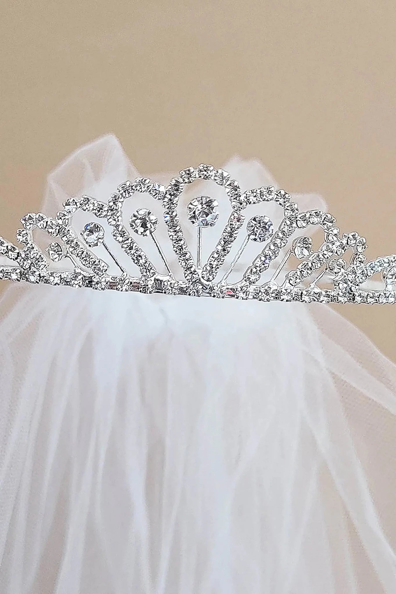 Silver and white rhinestone tulle flower girl and first communion tiara and two-tier veil.