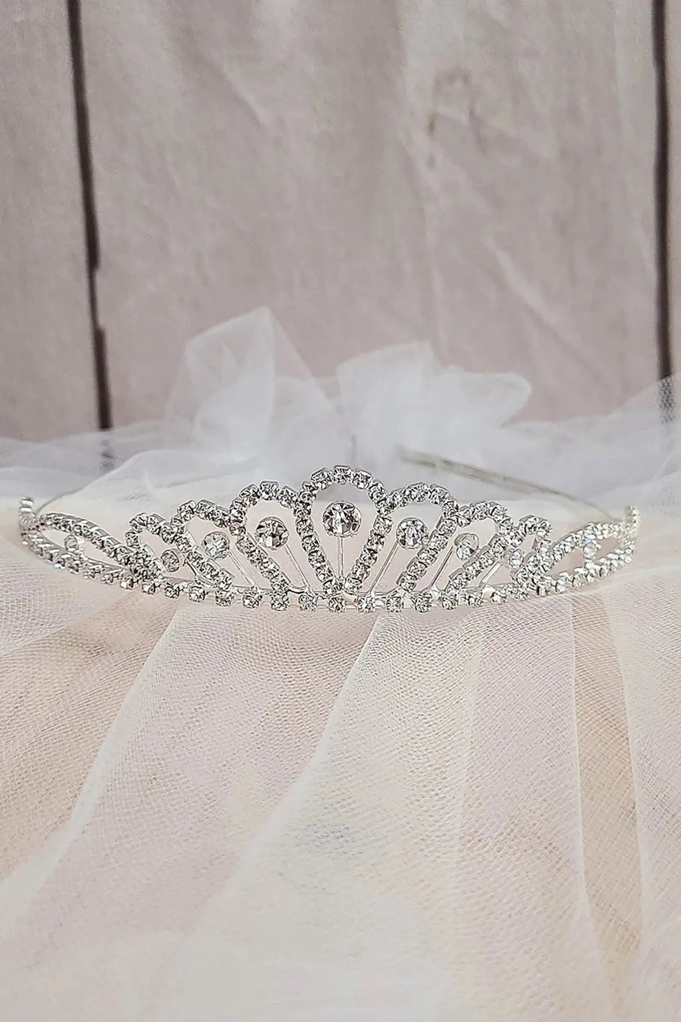 Silver and white rhinestone flower girl and first communion tiara and two-tier veil.