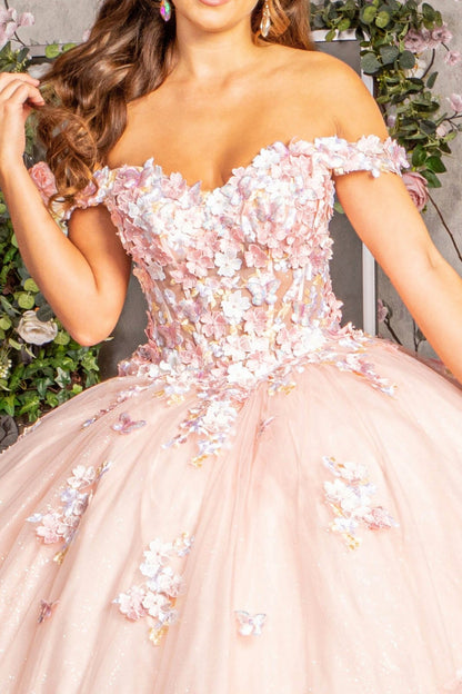 Pink floral off-shoulder dress with a soft focus background