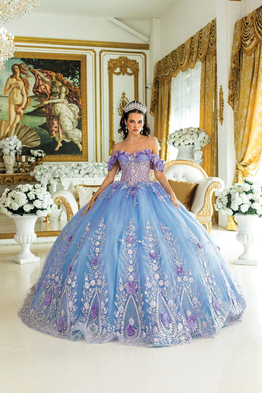 Woman standing front-facing in lilac quinceañera ball gown with off-shoulder floral appliqué sleeves, embroidered sheer corset bodice, 3D flower details, and layered voluminous skirt
