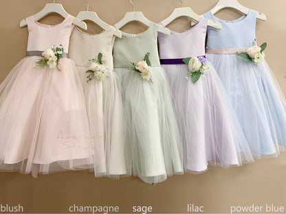 USA Made | Simple Dull Satin and Tulle dress with beautiful pin-on bouquet satin sash Flower Girl dress | 5 Colors Available - different color dresses side by side - blush, champagne, sage, lilac, powder blue colors.