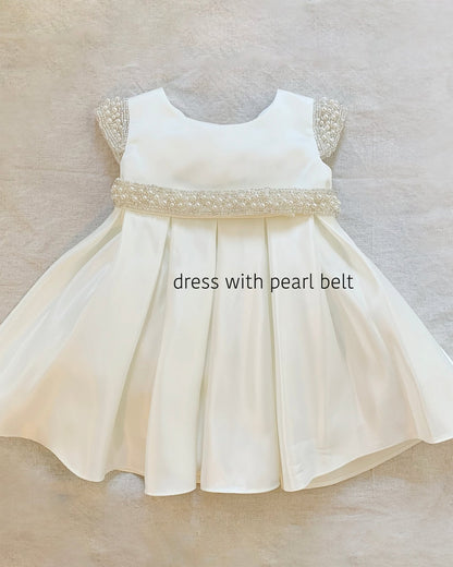 Ivory flower girl dress with pearl belt.