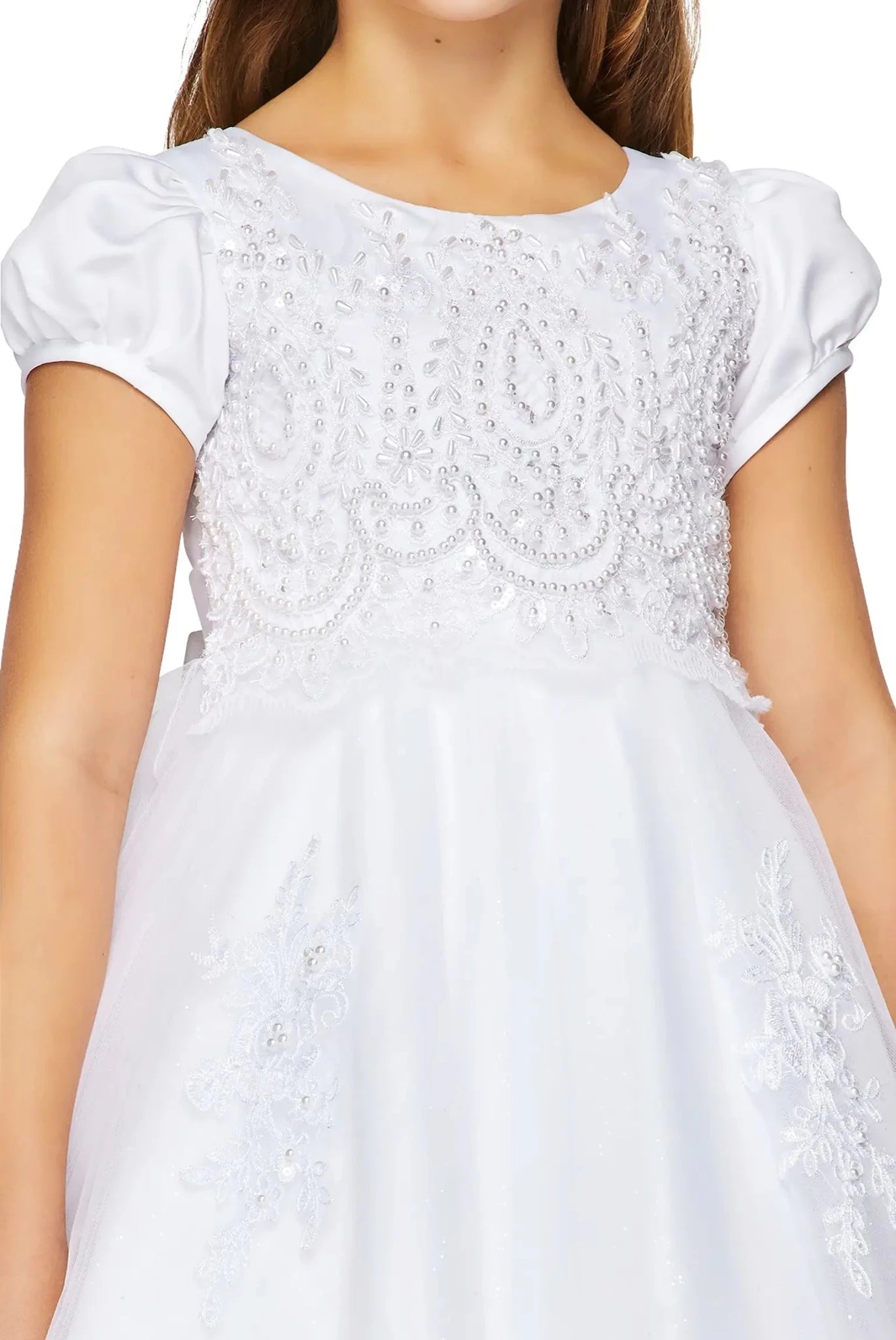 White puff sleeve communion dress with intricate lace pearl detailing.