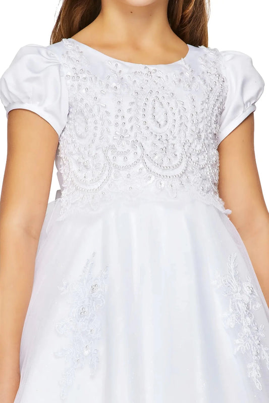 White puff sleeve communion dress with intricate lace pearl detailing.