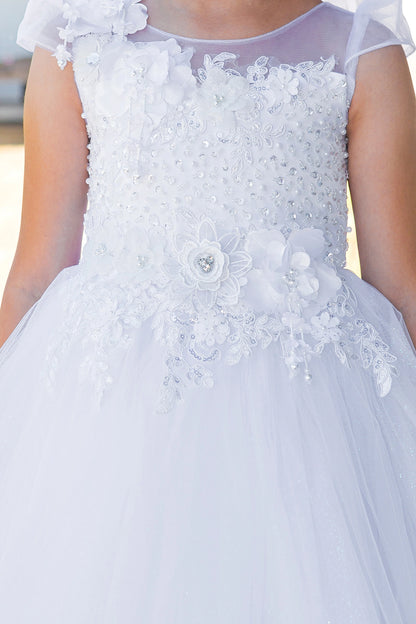 Dimensional flowers accent the illusion bodice on this White communion dress.