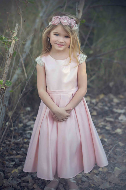 Blush Flower Girl Beaded Short Sleeves Dull Satin dress with Detachable Pearl Sash - girl wearing dress and flower headband