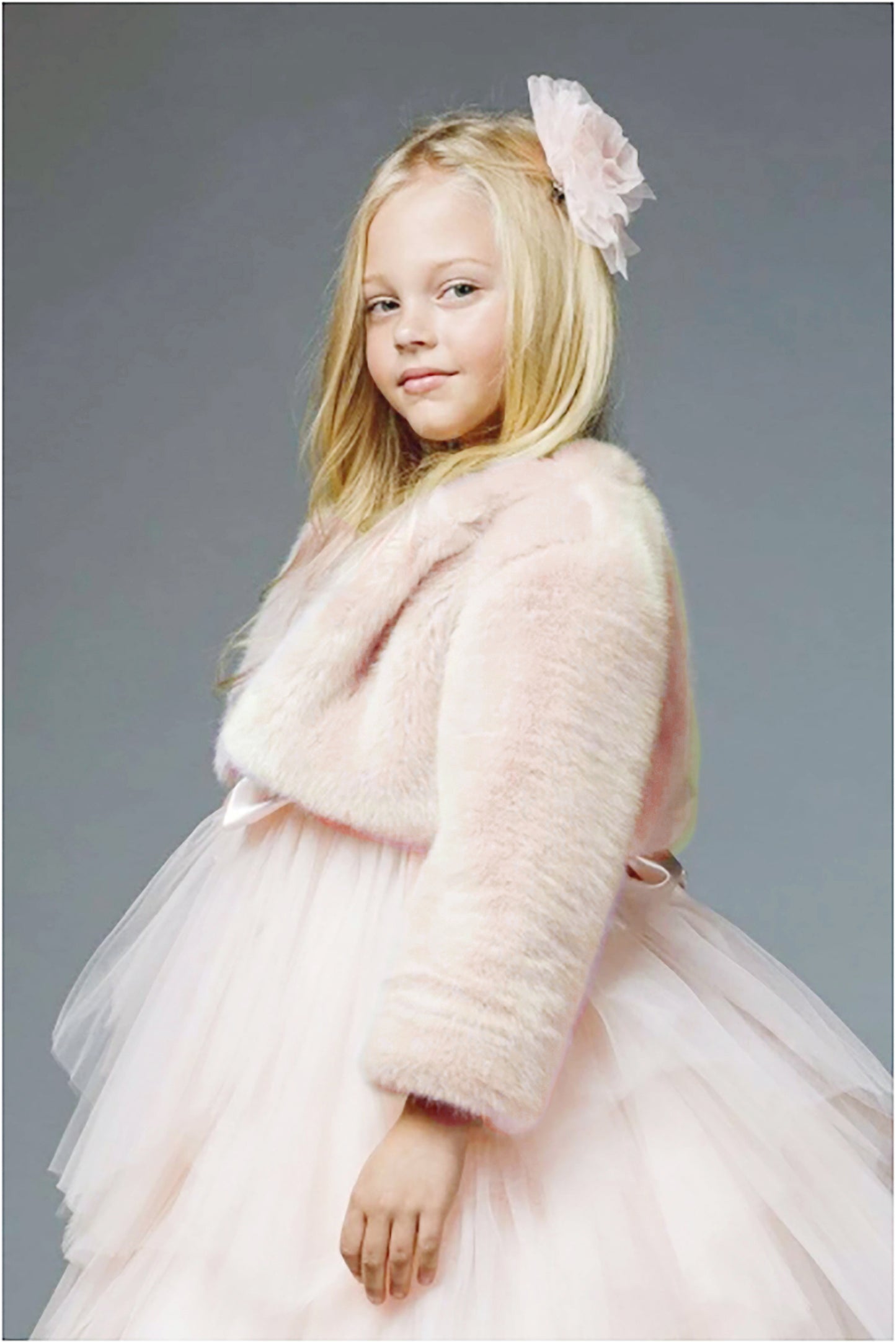 Blush Sweet Glamorous Soft Faux Fur Flower Girl Jacket Success - side view of girl wearing dress