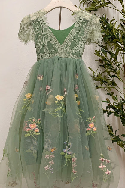 Sage lace tulle flower girl dress with floral and butterfly embroidery and cap sleeves v-back.