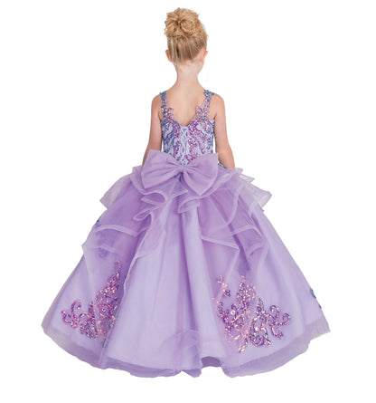 Lavender dress with floral embellishments and a large bow on a white background