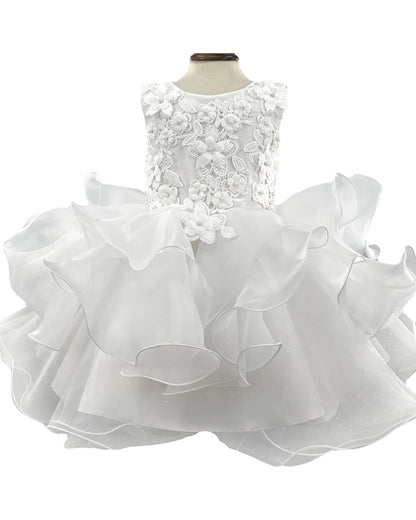 White floral dress on a mannequin against a white background