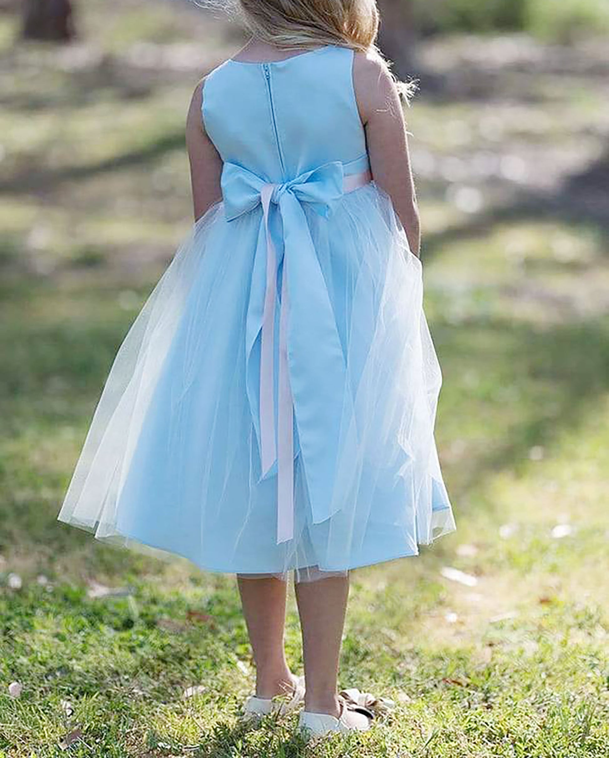 USA Made | Simple Dull Satin and Tulle dress with beautiful pin-on bouquet satin sash Flower Girl dress | 5 Colors Available - back view of girl wearing dress standing on grass