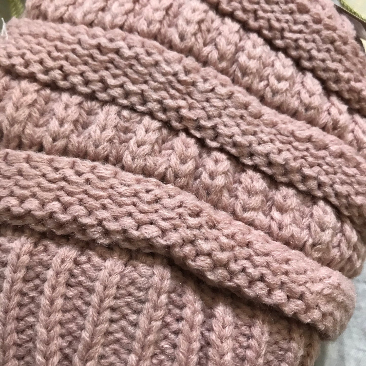 Multi color women's winter beanie, close-up view.