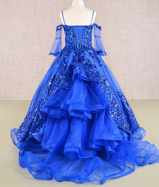 Blue evening gown with sequin detailing on a mannequin against a neutral background