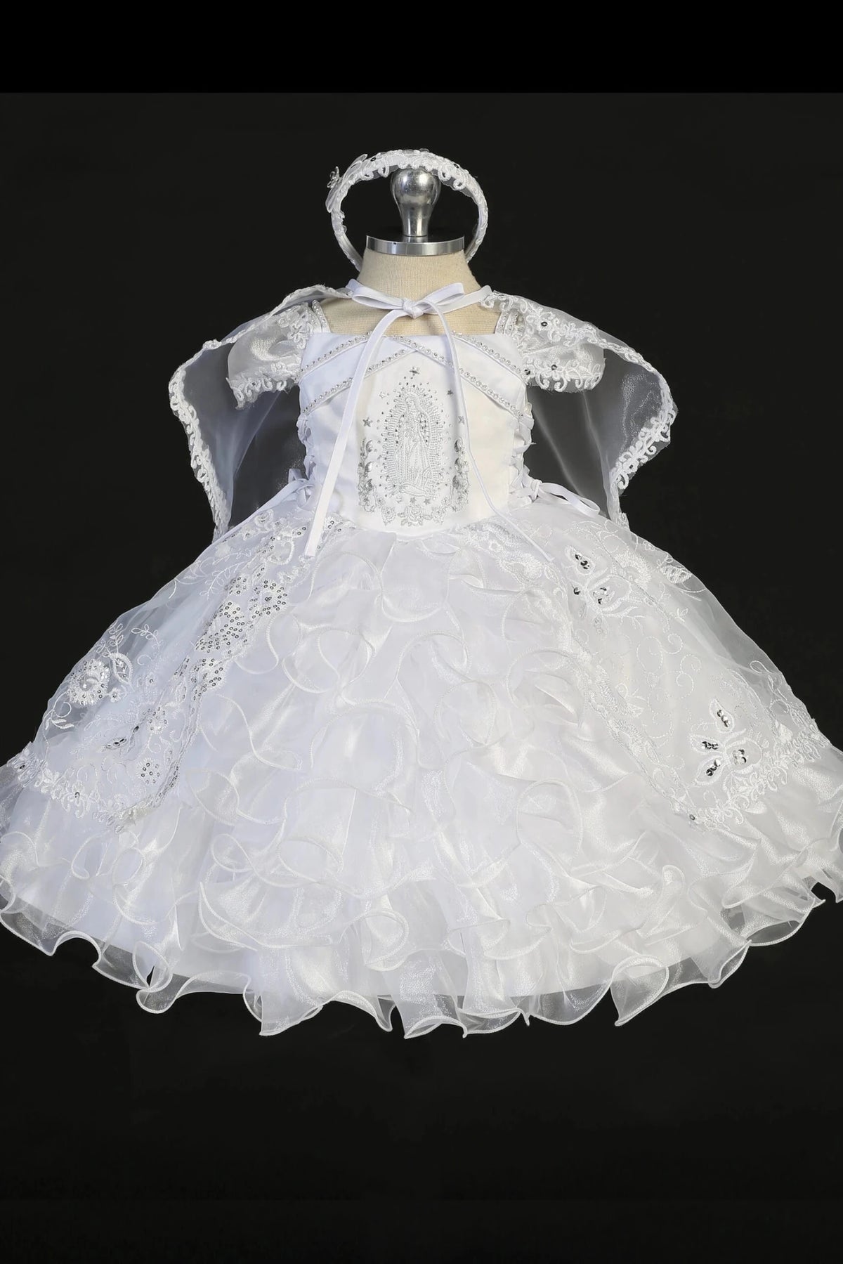 White christening dress with double spaghetti straps and rhinestone accents.