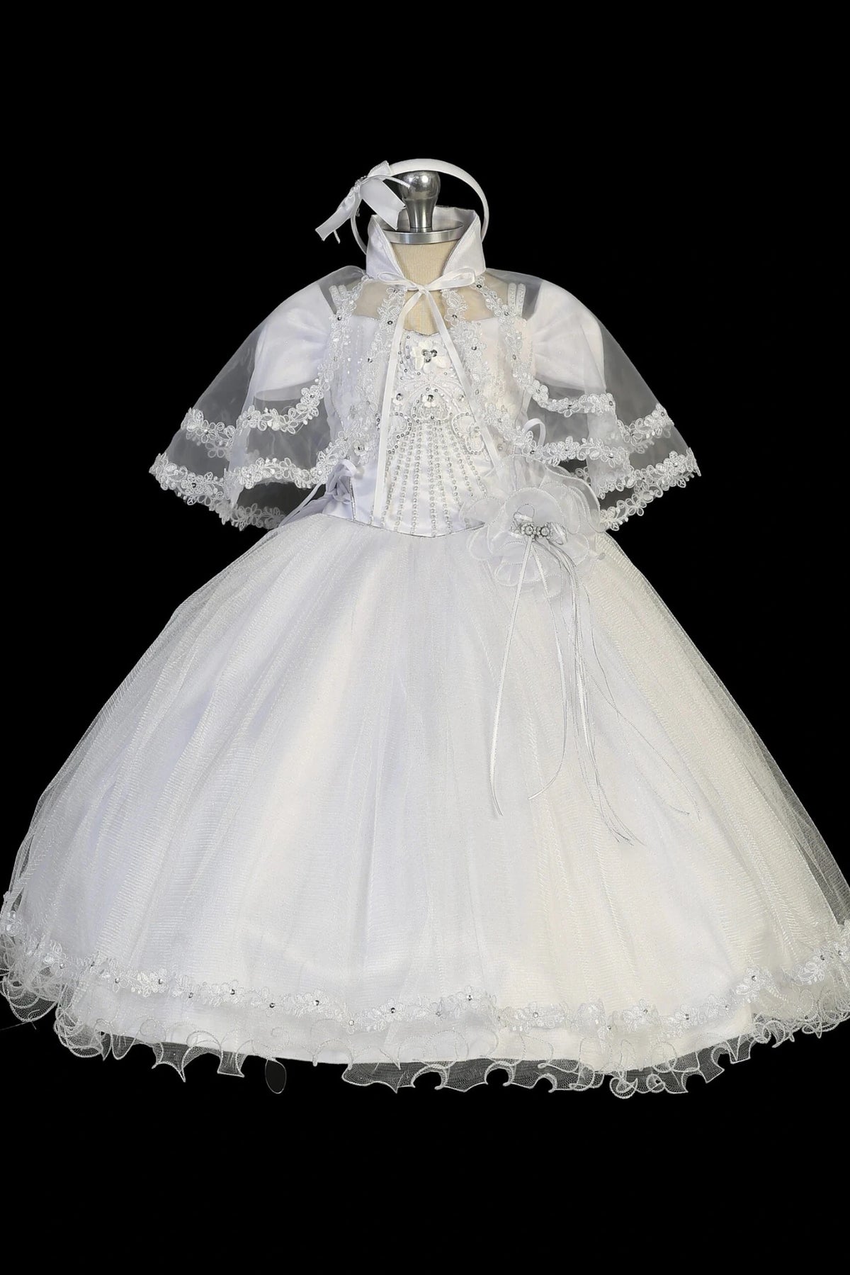 White baptism dress with lace bodice with double straps and rhinestone accents.