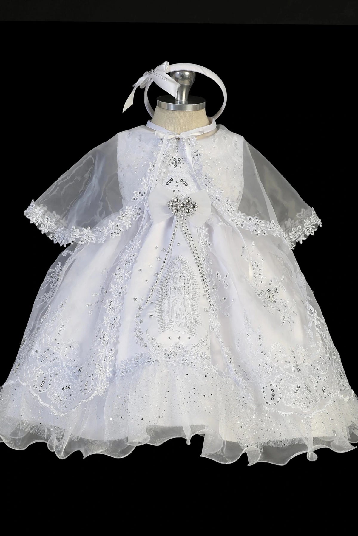 White christening dress with sequined lace bodice and a split organza overlay.
