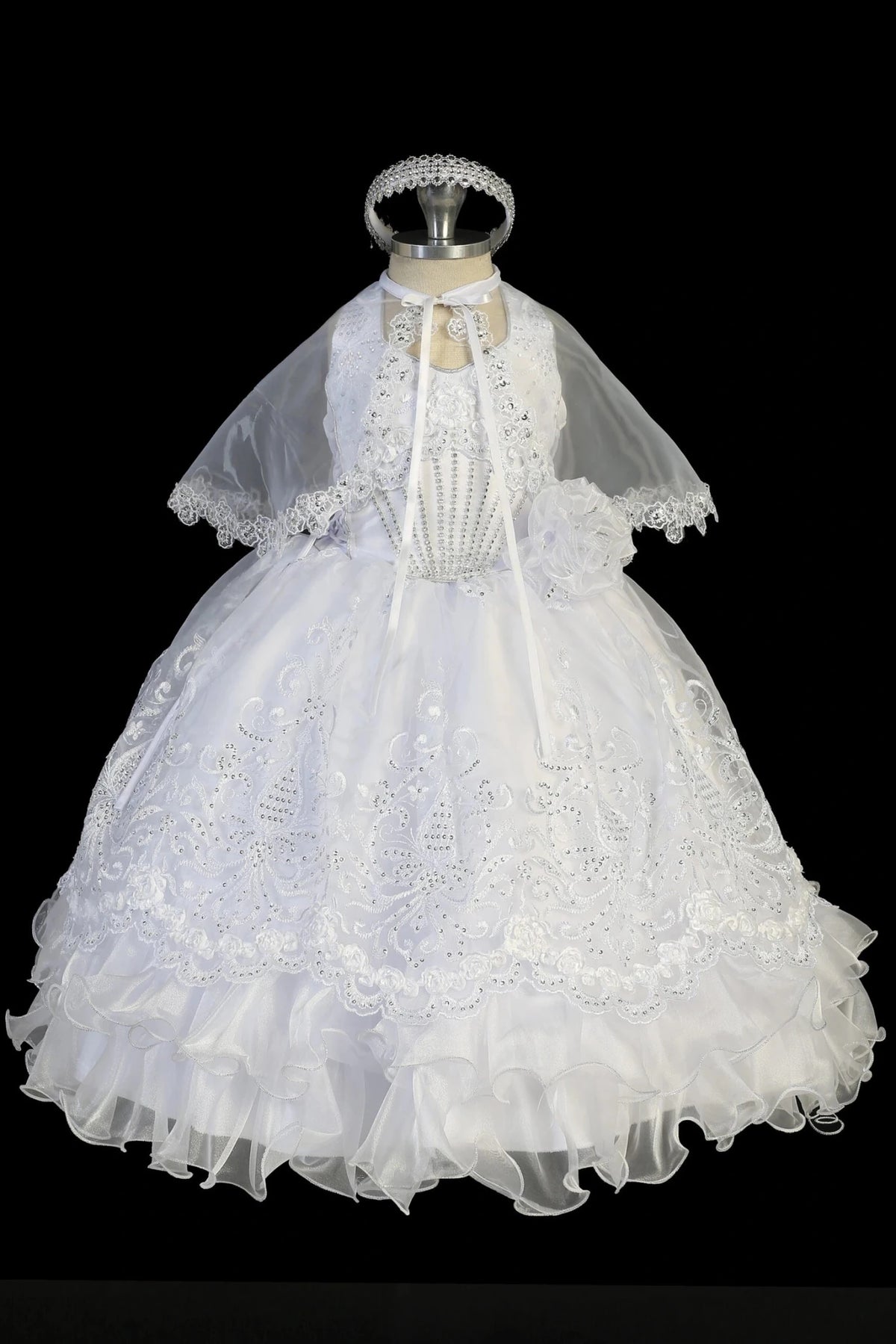 White christening dress with embroidered lace bodice with rhinestone accents.