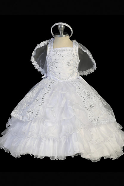 White baptism dress with sequined lace bodice and crisscross back straps.