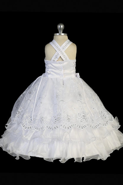 Back view of the White baptism dress showing crisscross back straps and ties.