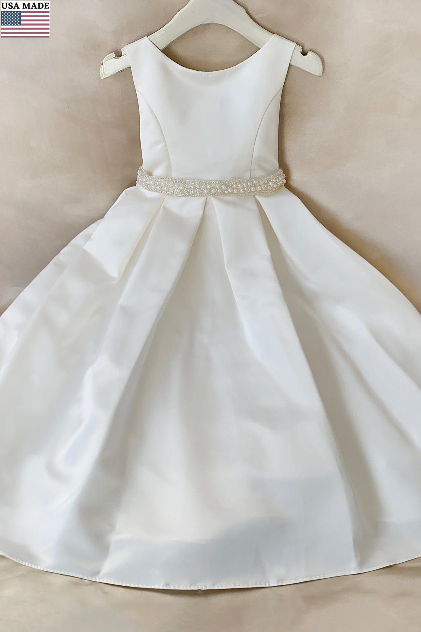 Ivory flower girl communion dress with a pearl belt bow. Also suitable as a flower girl dress. Also suitable as a baptism dress.