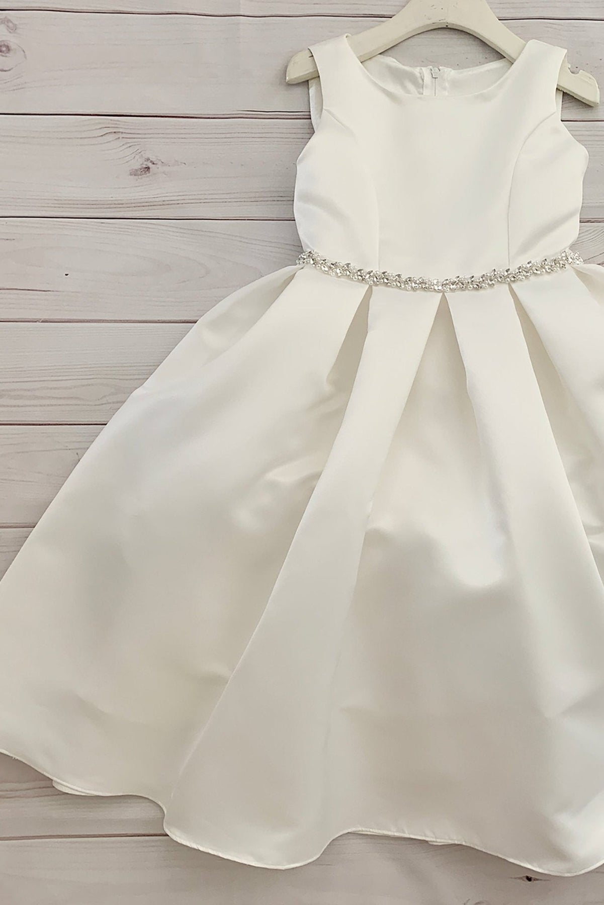 Front view of ivory Fully Satin flower girl dress with Rhinestone and Pearl Flower Girl, and Communion. Also suitable as a communion dress. Also suitable as a baptism dress.