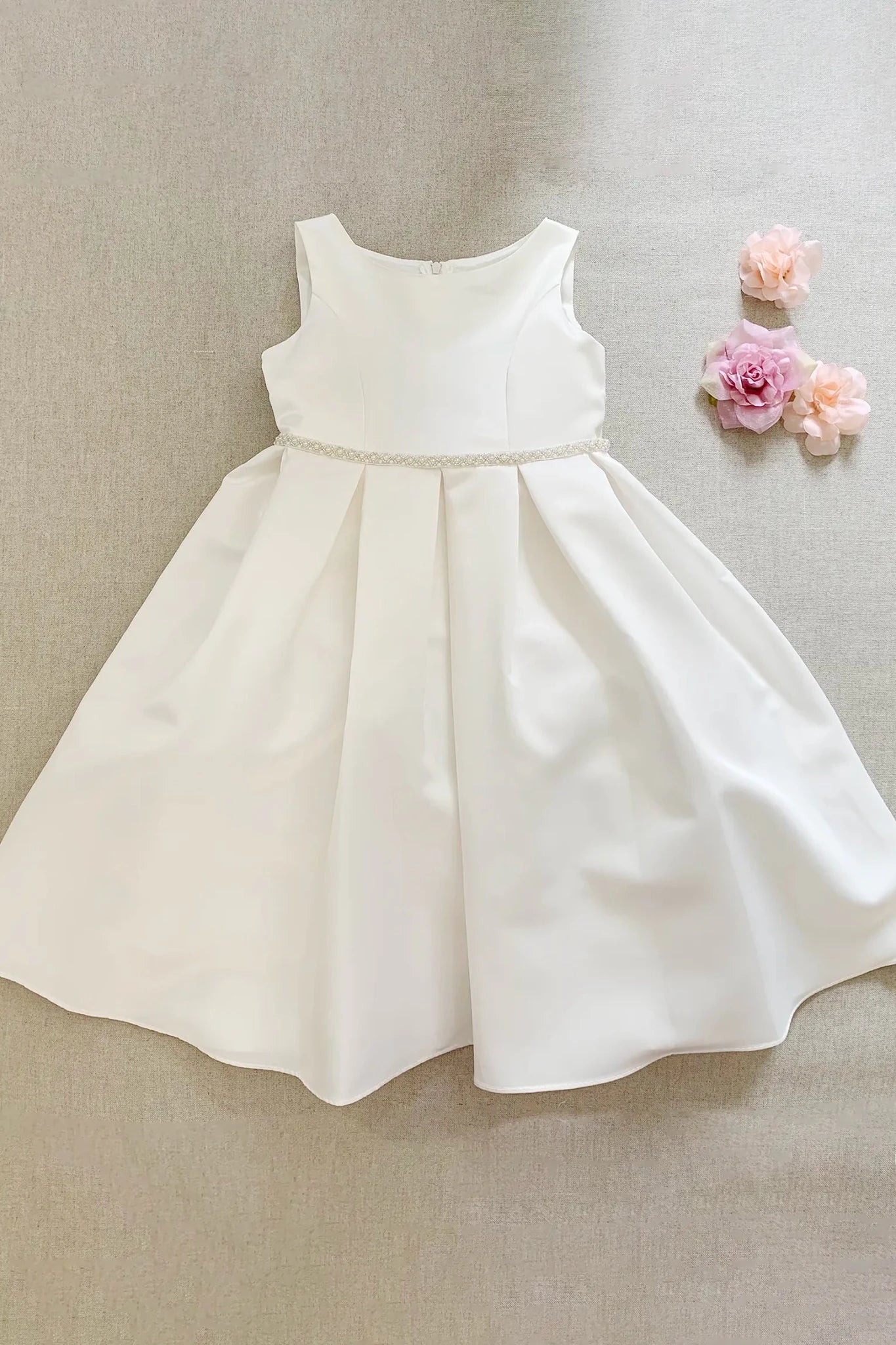 Ivory full satin flower girl communion dress with delicate pearl on a waist. Also suitable as a flower girl dress. Also suitable as a baptism dress.