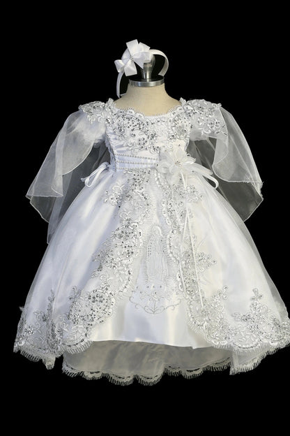 White baptism dress with boat neckline with metallic corded lace and sequins.