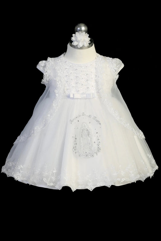 White baptism dress with cap-sleeved sequined bodice with scattered pearls.