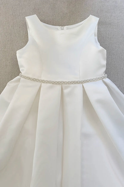 full satin girls formal dress with delicate pearl embellishments and flowing A-line silhouette