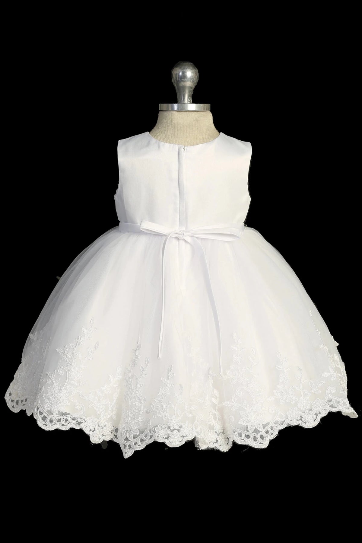 Back view of the White baptism dress showing bow and lace details at the back.
