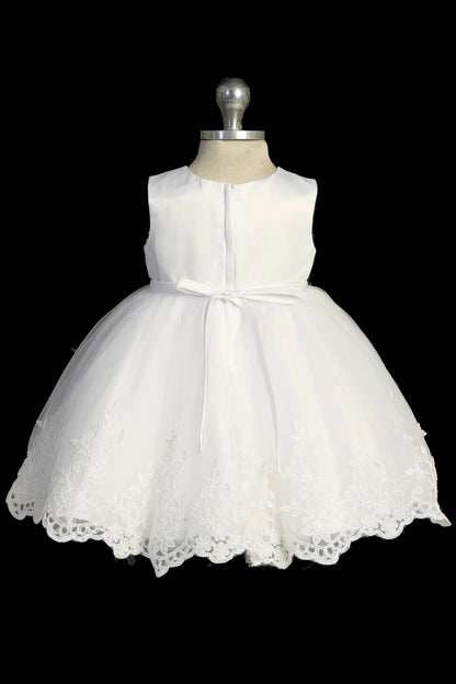 Back view of the White baptism dress showing bow and lace details at the back.