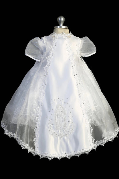 Back view of the White christening dress showing Virgin Mary embroidery on the organza vest.