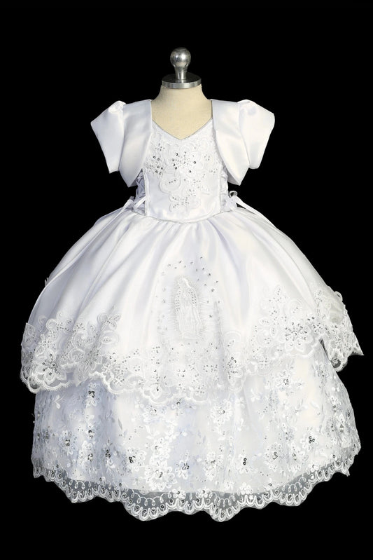 White baptism dress with satin-and-lace bodice and Virgin Mary skirt embroidery.