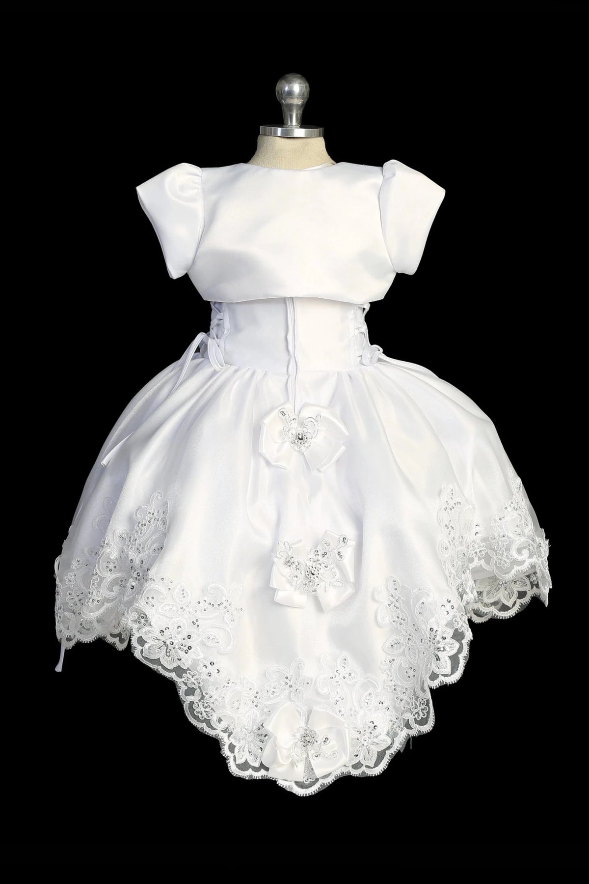 Back view of the White baptism dress showing satin bolero and back tie detail.