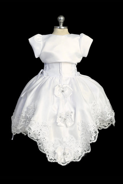 Back view of the White baptism dress showing satin bolero and back tie detail.