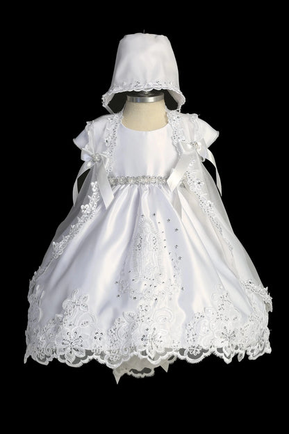 White christening dress with cap-sleeved satin bodice and a pearl waist accent.