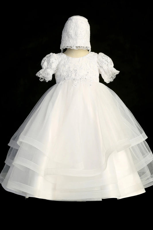 Ivory christening dress with puff-sleeved embroidered lace bodice.
