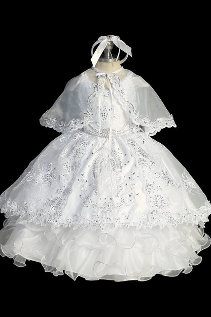 White baptism dress with cap-sleeved lace bodice and a removable waist brooch.