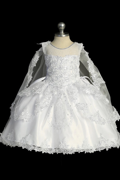 White baptism dress with lace illusion neckline and a layered split skirt.