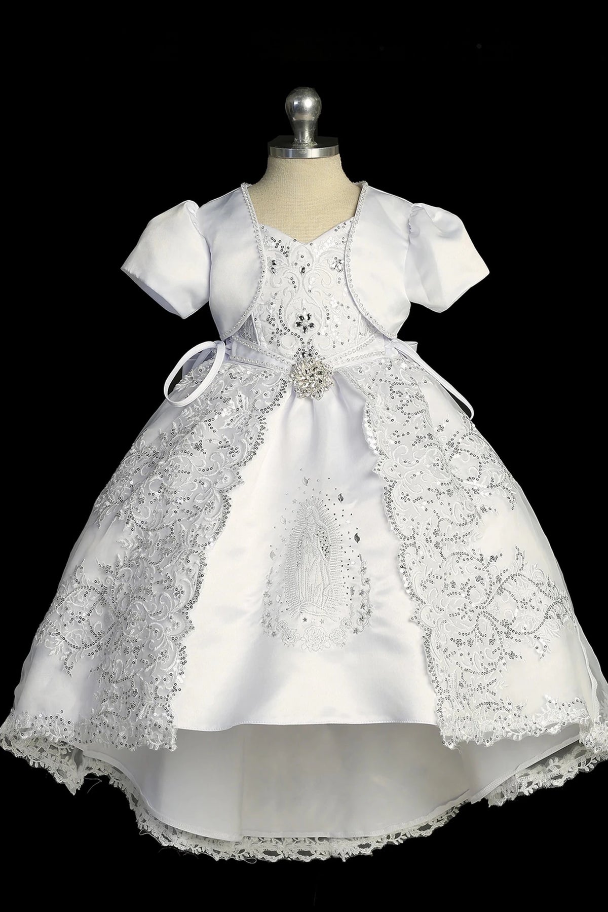 White baptism dress with sweetheart neckline and lace tab straps.