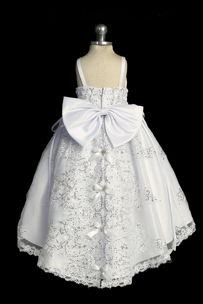 Back view of the White baptism dress showing large satin back bow and lace skirt.
