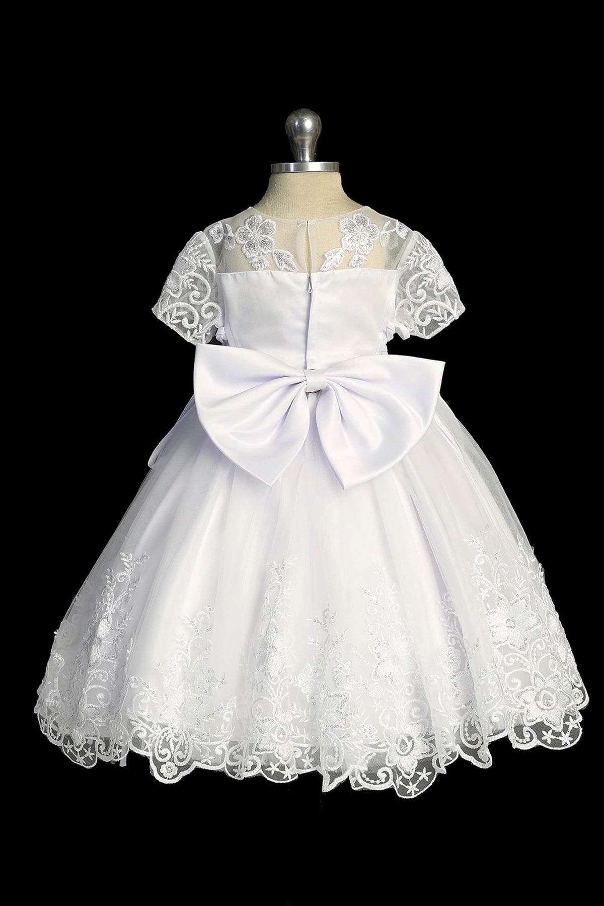 Back view of the White baptism dress showing large removable satin back bow.