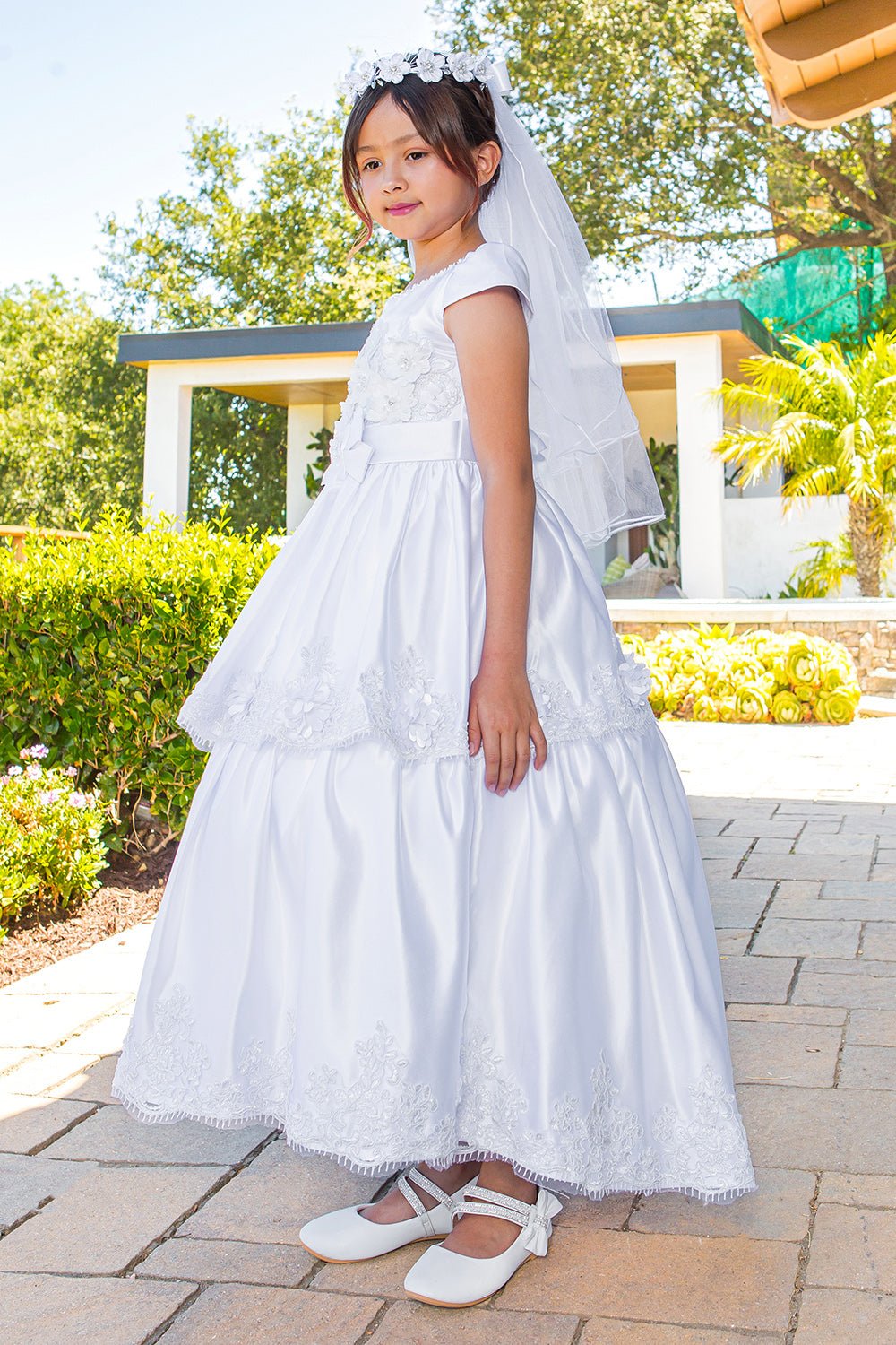 Elegant Illusion Top satin Cap Sleeve Embellished Skirt Communion Dress with Beads, Laces and Back Satin Sash - side view of dress.