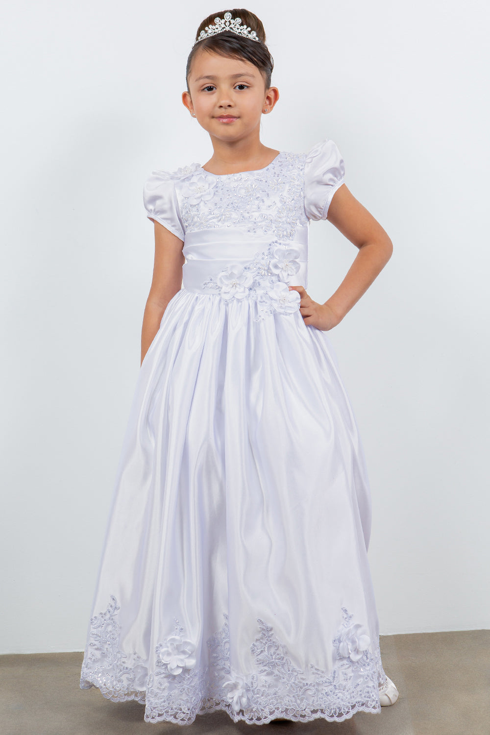 Elegant Satin Cap Sleeve Communion Dress with Beads, Laces and back satin sash - girl wearing dress with one hand on hip