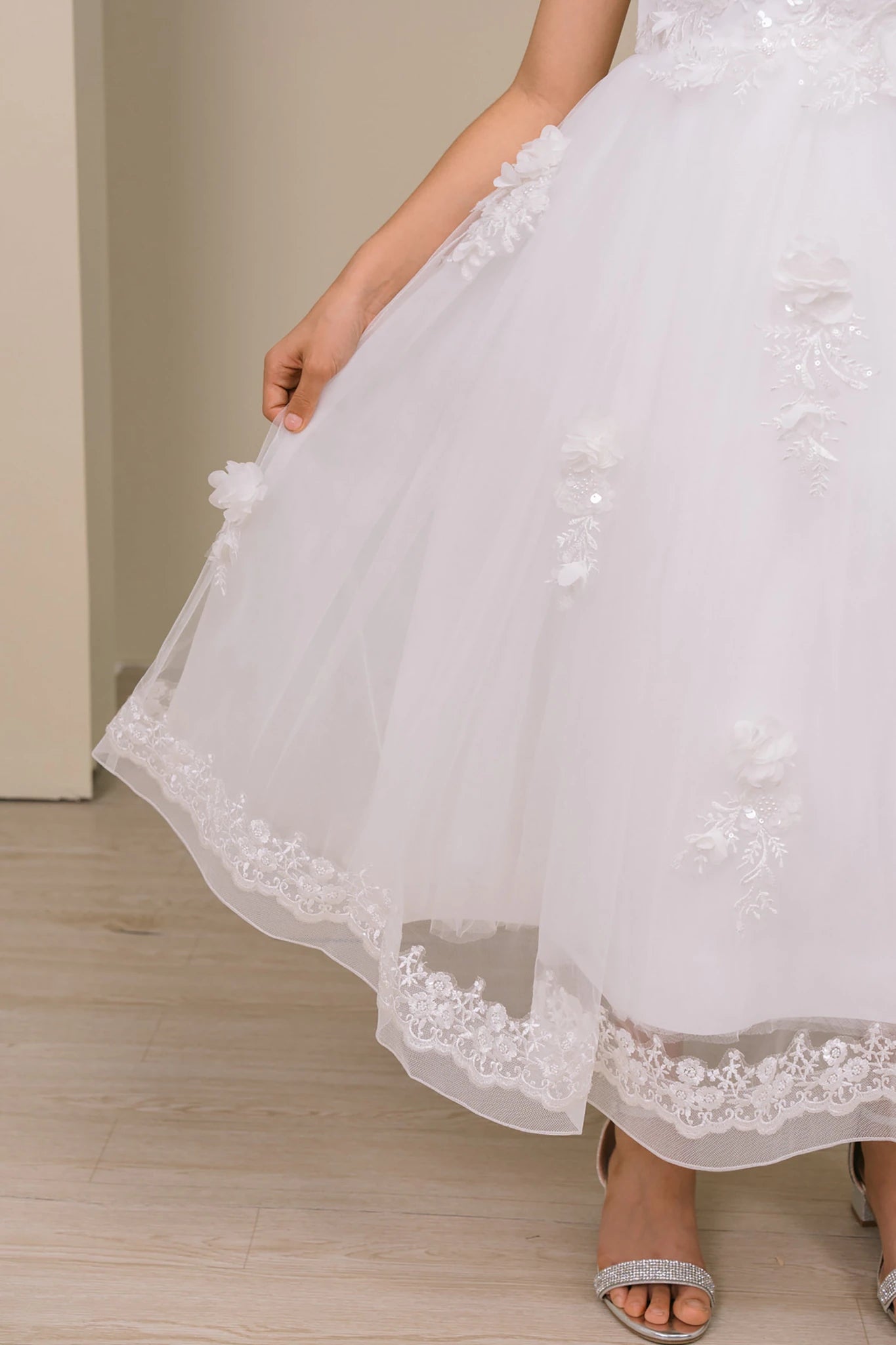 Showing a tulle skirt. Flower girl dress. Also suitable as a communion dress.
